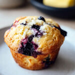 Moist lemon blueberry muffins with juicy berries and golden crumb